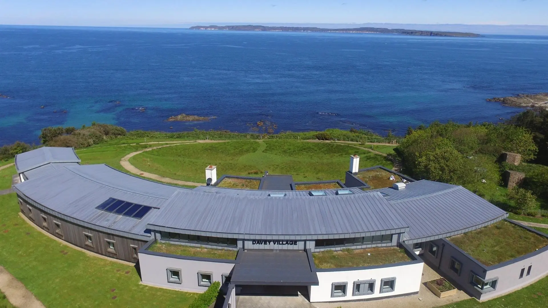 Aerial view of a meditation center located on the north coast of Ireland